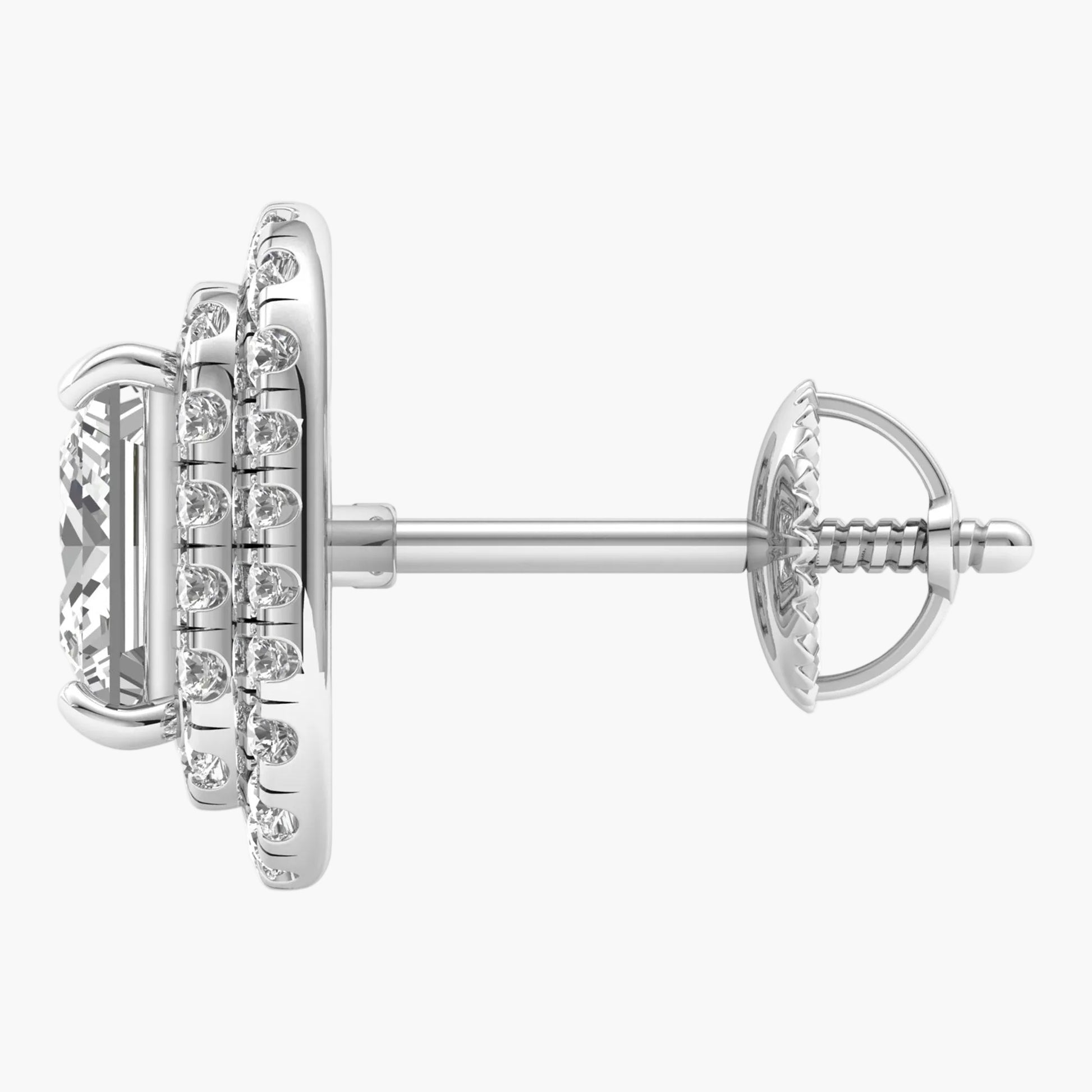 Silver earring with gemstones on a white background