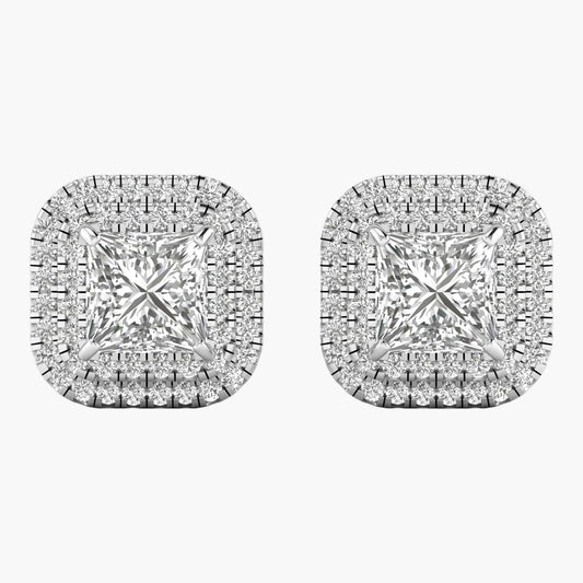 Pair of diamond earrings on a white background