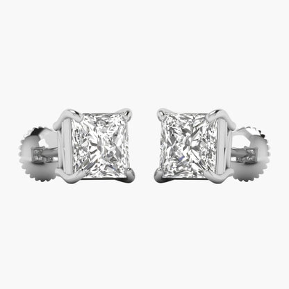Pair of diamond stud earrings on a white background