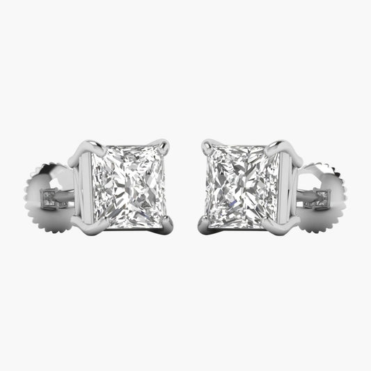 Pair of diamond stud earrings on a white background