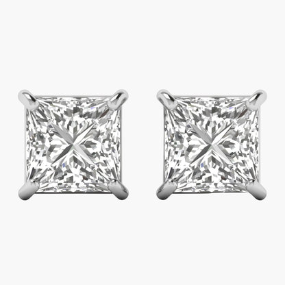 Pair of diamond stud earrings on a white background