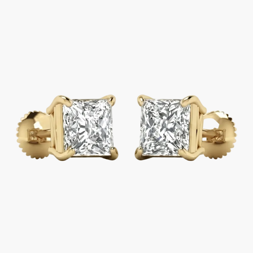 A pair of yellow gold stud earrings, each featuring a square princess-cut clear gemstone in a four-prong setting with a screw-back clasp, shown against a plain white background.