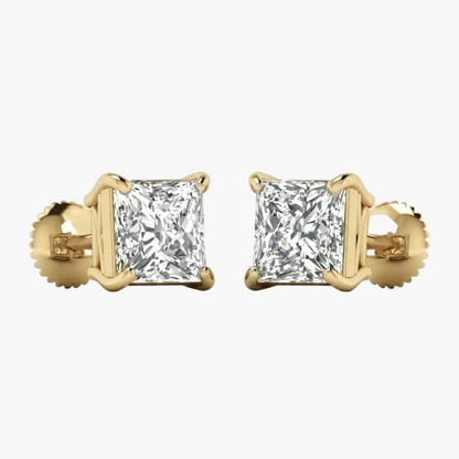 A pair of yellow gold stud earrings, each featuring a square princess-cut clear gemstone in a four-prong setting with a screw-back clasp, shown against a plain white background.