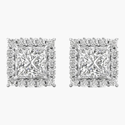 Pair of diamond earrings on a white background
