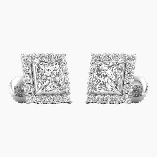 Pair of diamond earrings on a white background