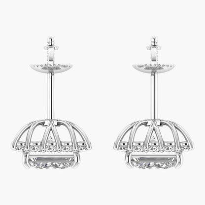 Pair of silver earrings with intricate designs on a white background