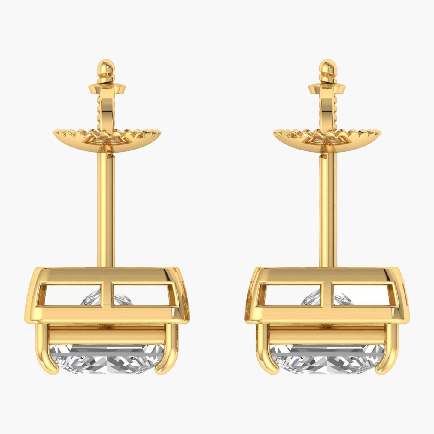 Gold earrings with clear gemstones on a white background