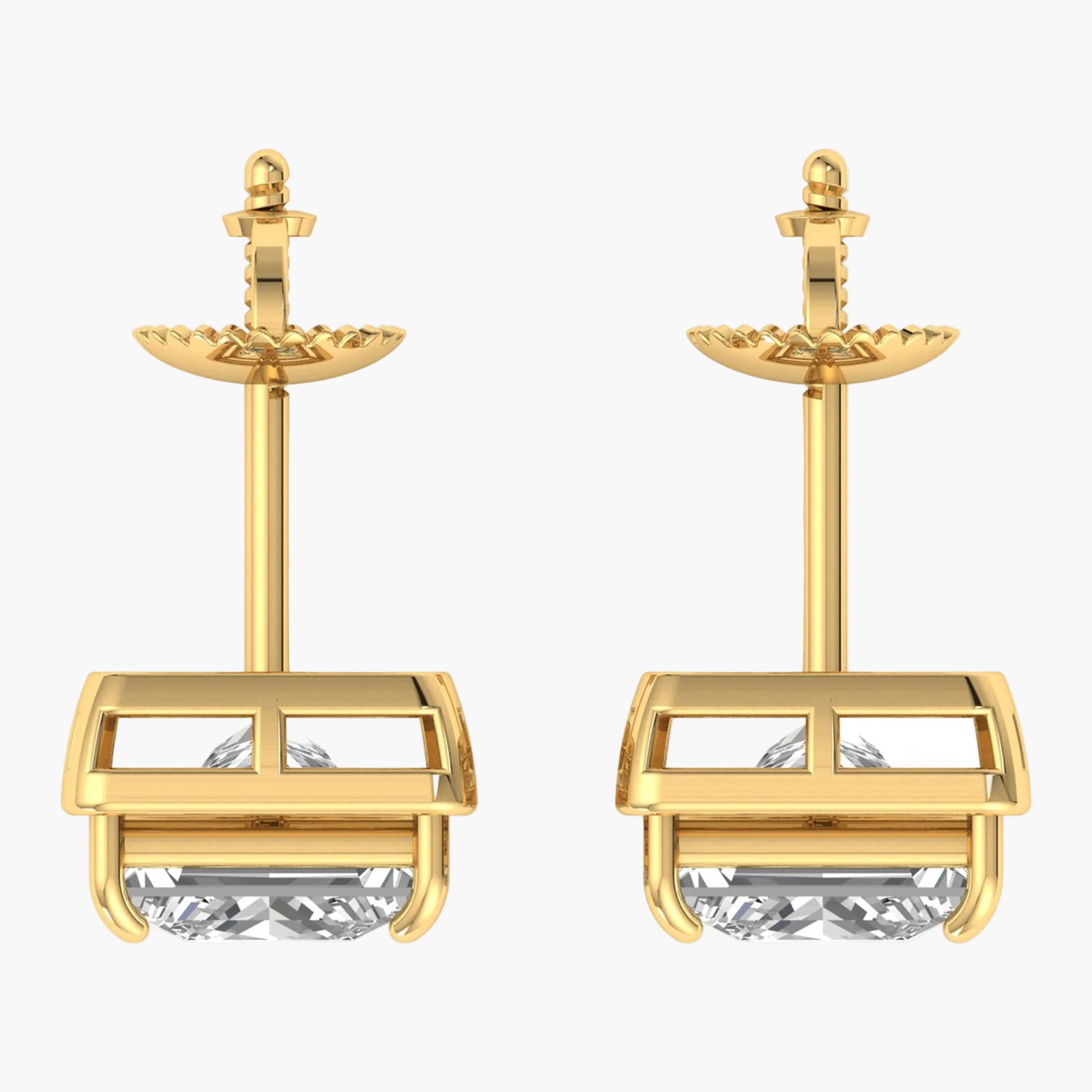 Gold earrings with clear gemstones on a white background