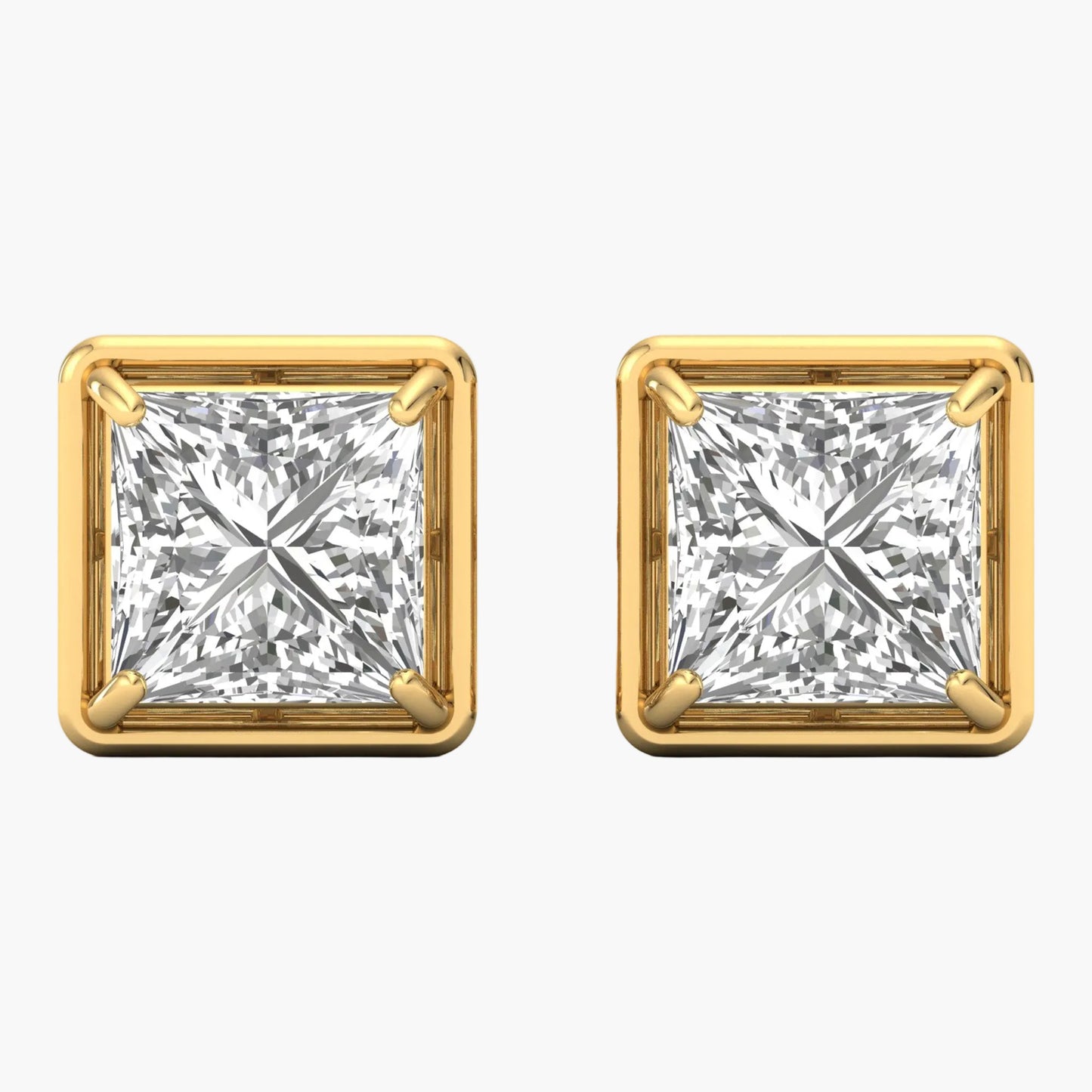 Pair of gold square-cut diamond earrings on a white background