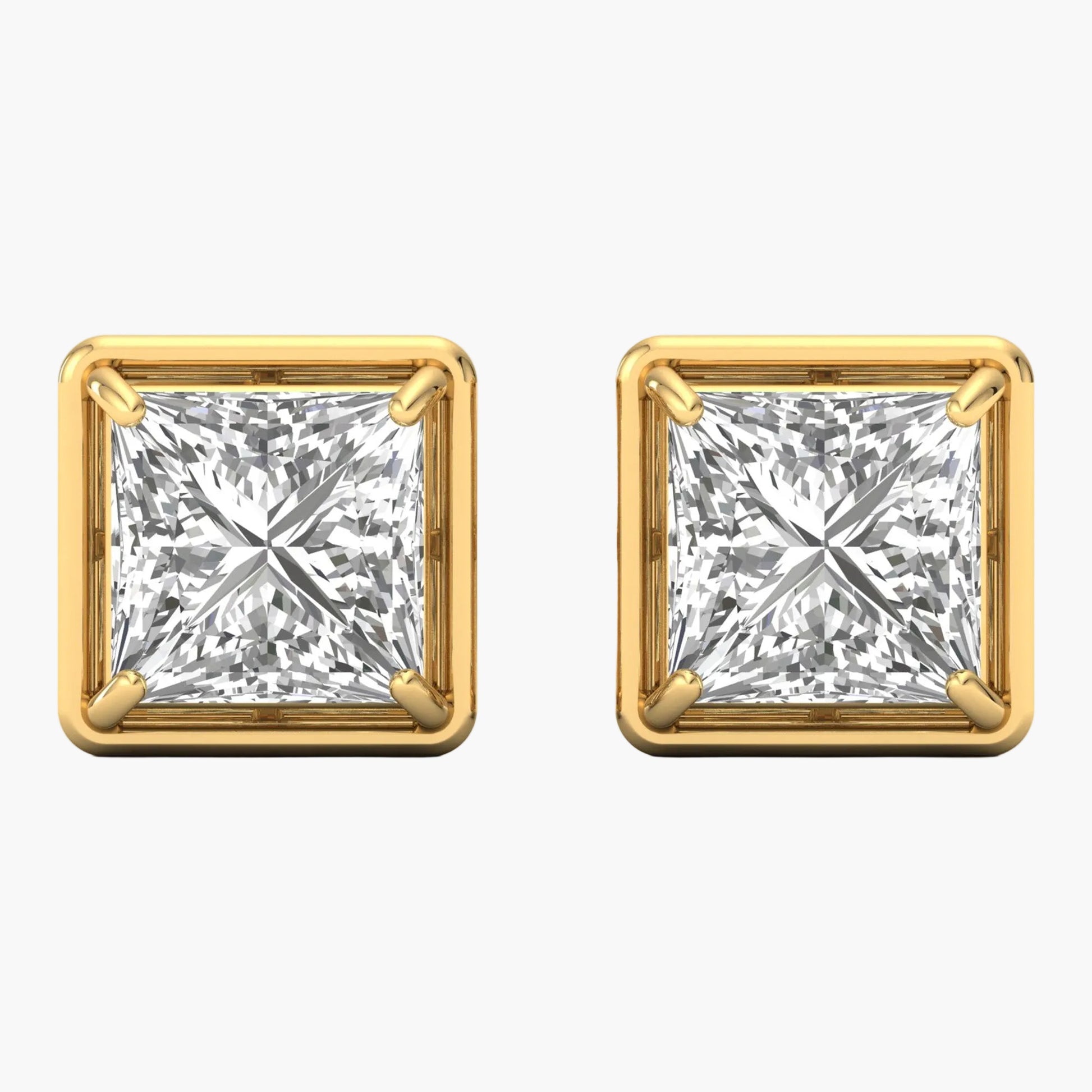 Pair of gold square-cut diamond earrings on a white background