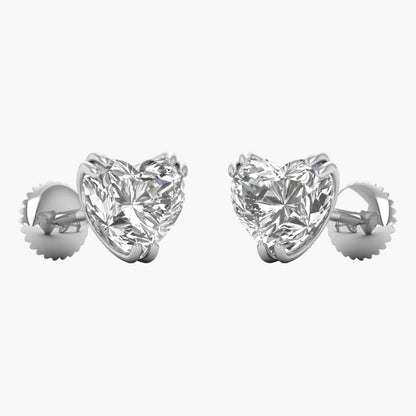 Heart-shaped diamond earrings on a white background