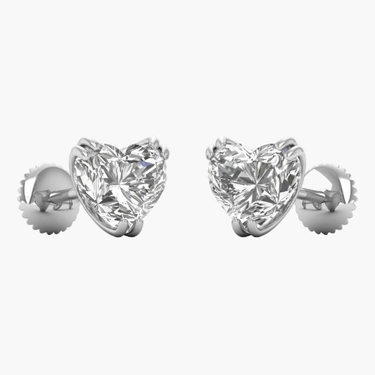Heart-shaped diamond earrings on a white background
