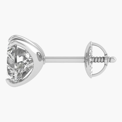 Silver earring with a clear gemstone on a white background