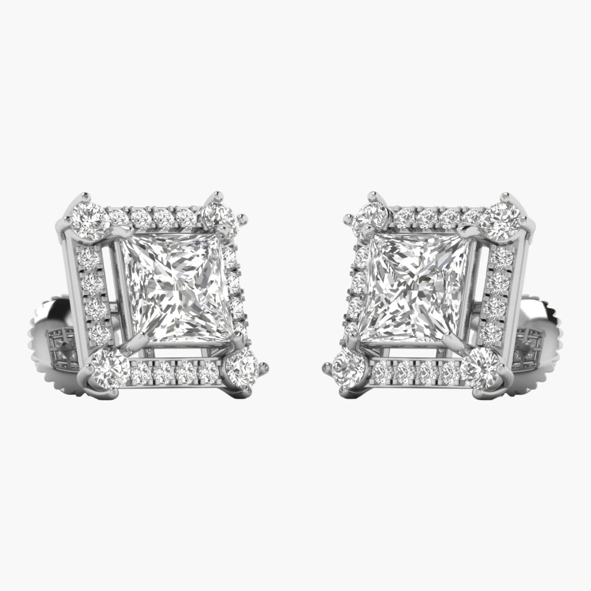 Pair of diamond earrings on a white background
