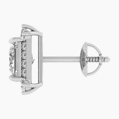 Silver earring on a white background