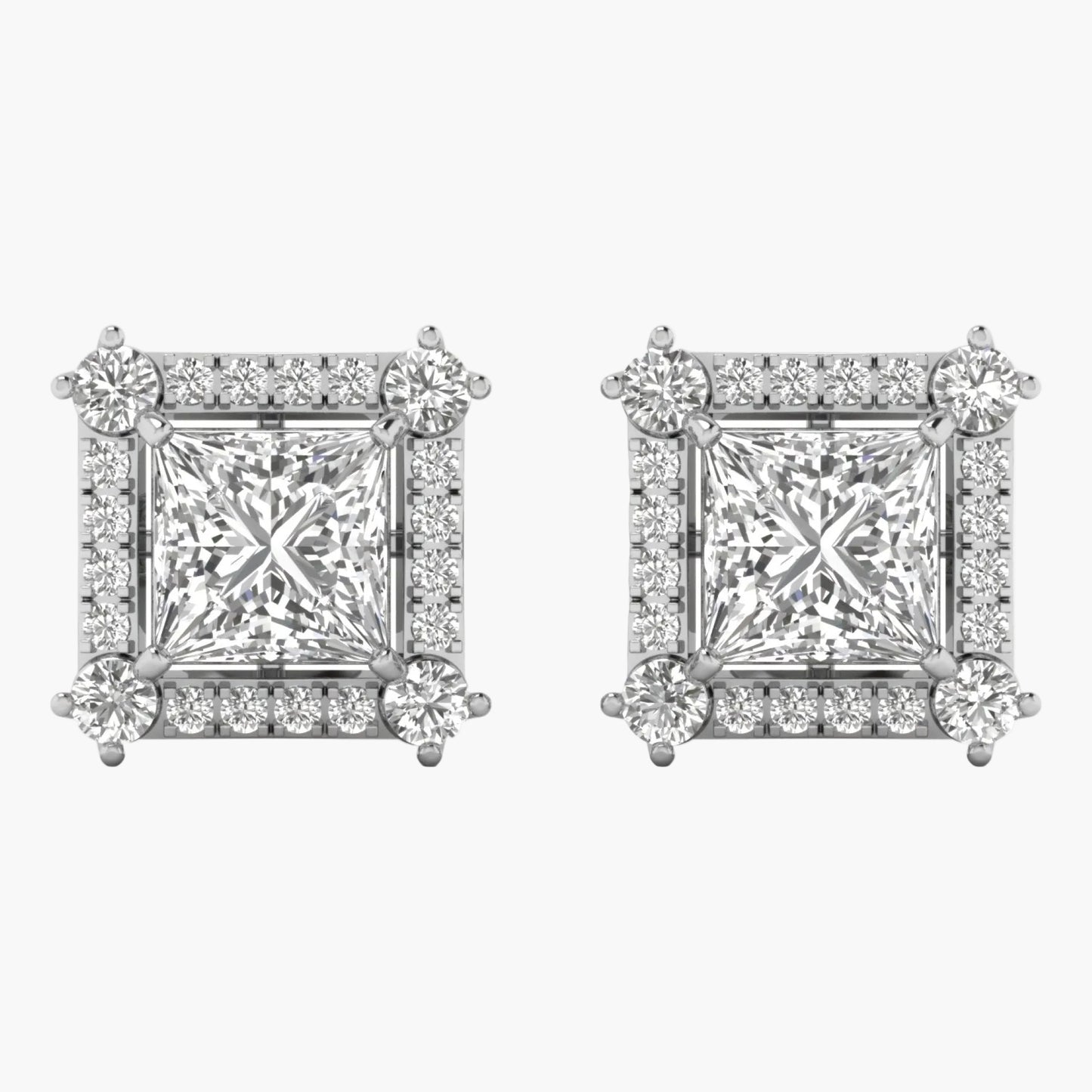 Pair of diamond square earrings on a white background