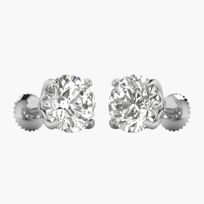 Pair of diamond stud earrings on a white background