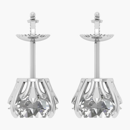 Pair of silver earrings with clear gemstones on a white background