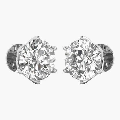 Pair of diamond stud earrings on a white background