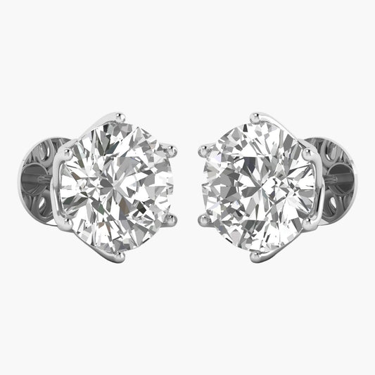 Pair of diamond stud earrings on a white background