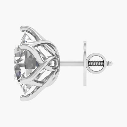 Silver earring with a clear gemstone on a white background