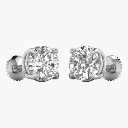 Pair of diamond stud earrings on a white background