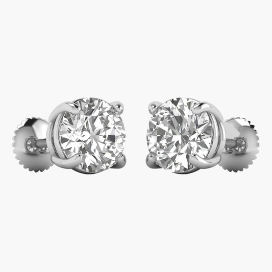 Pair of diamond stud earrings on a white background