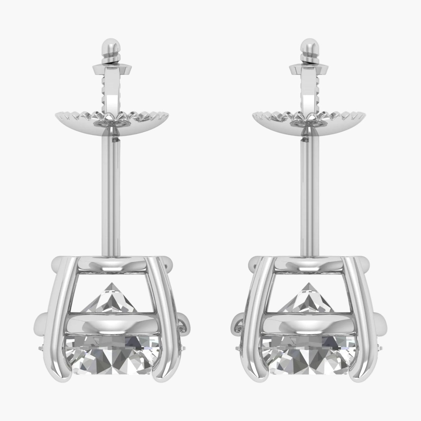 Pair of silver earrings with clear gemstones on a white background