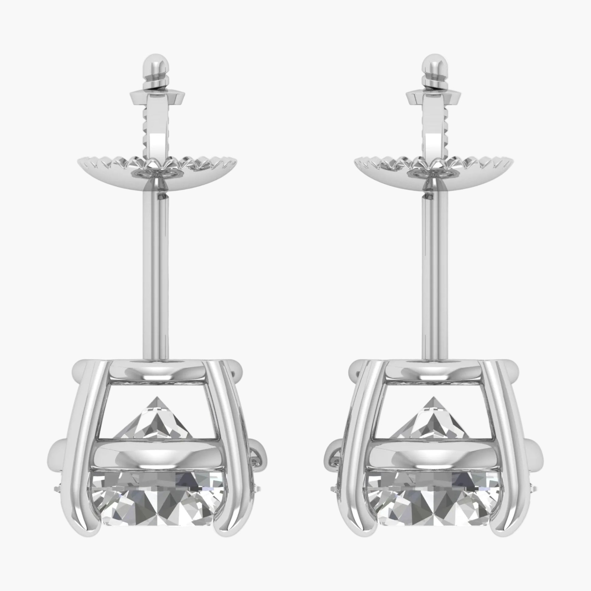 Pair of silver earrings with clear gemstones on a white background