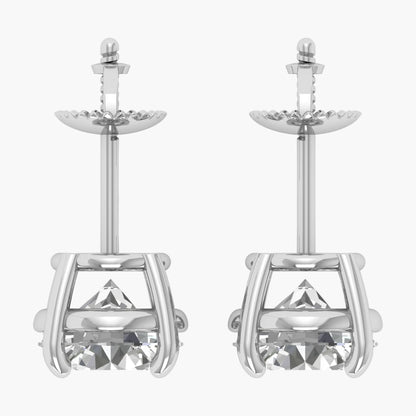 Pair of silver earrings with clear gemstones on a white background