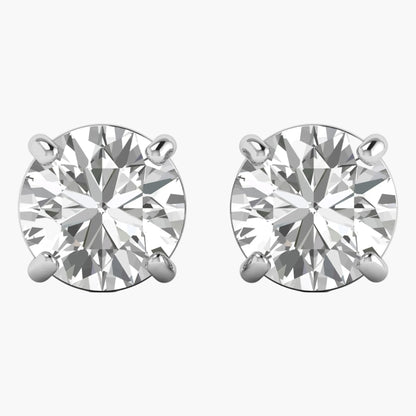 Pair of diamond stud earrings on a white background