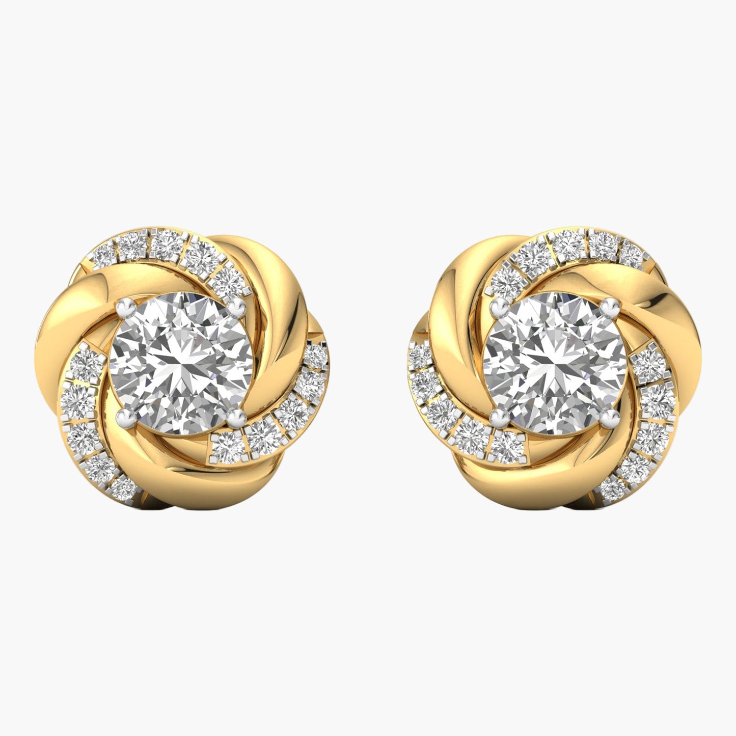 Gold earrings with diamond-like stones on a white background