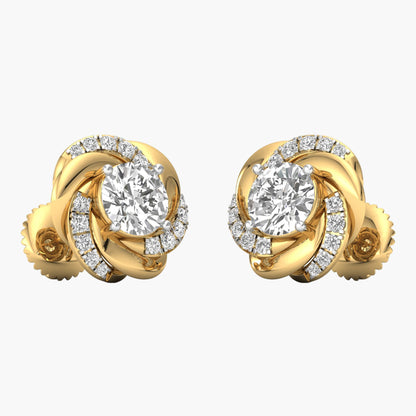 Gold earrings with diamond accents on a white background