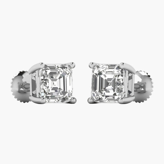 Pair of diamond stud earrings on a white background