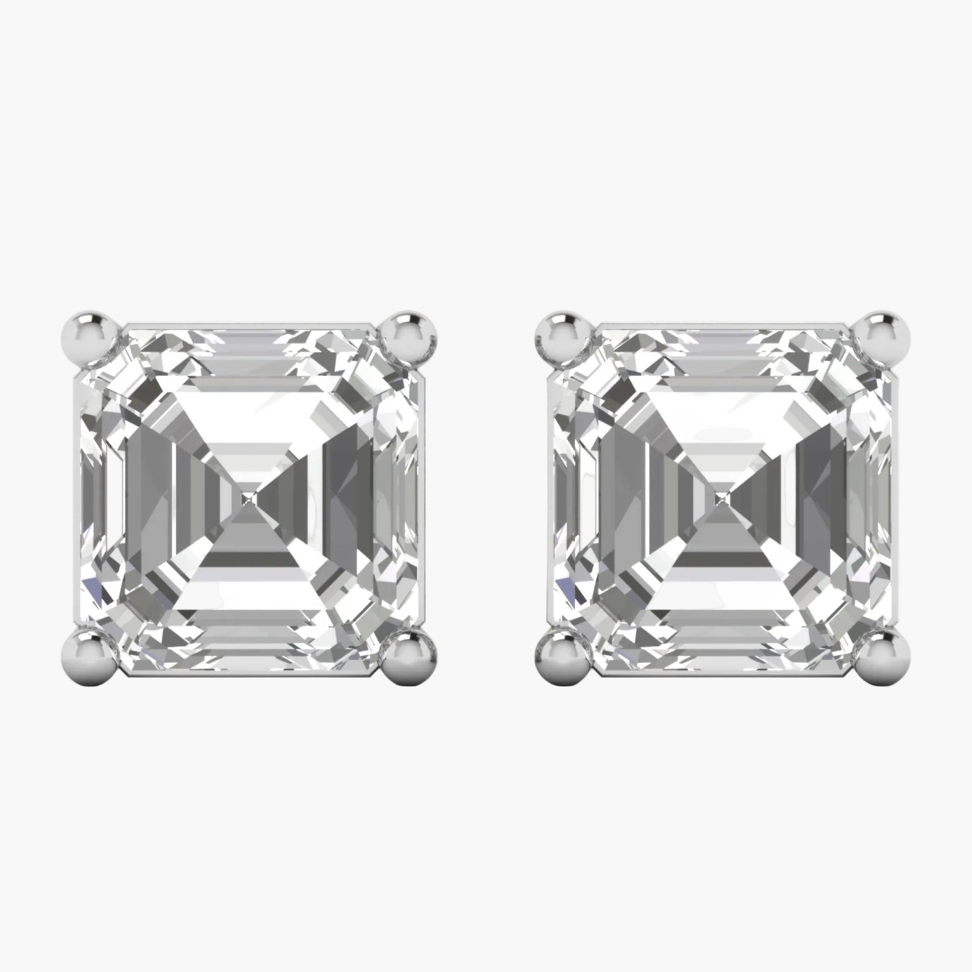 Asscher-cut diamond earrings on a white background