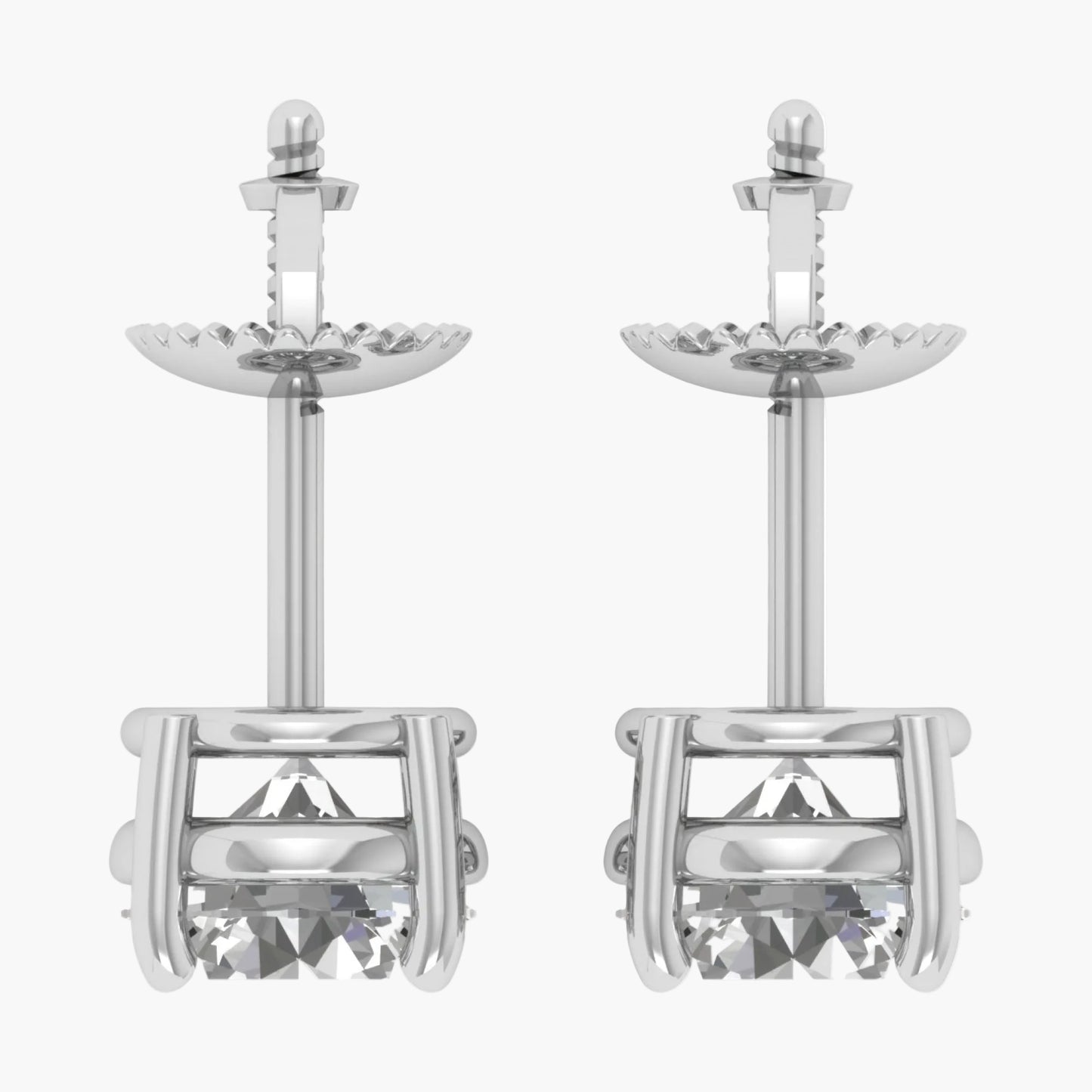 Pair of silver earrings with clear gemstones on a white background