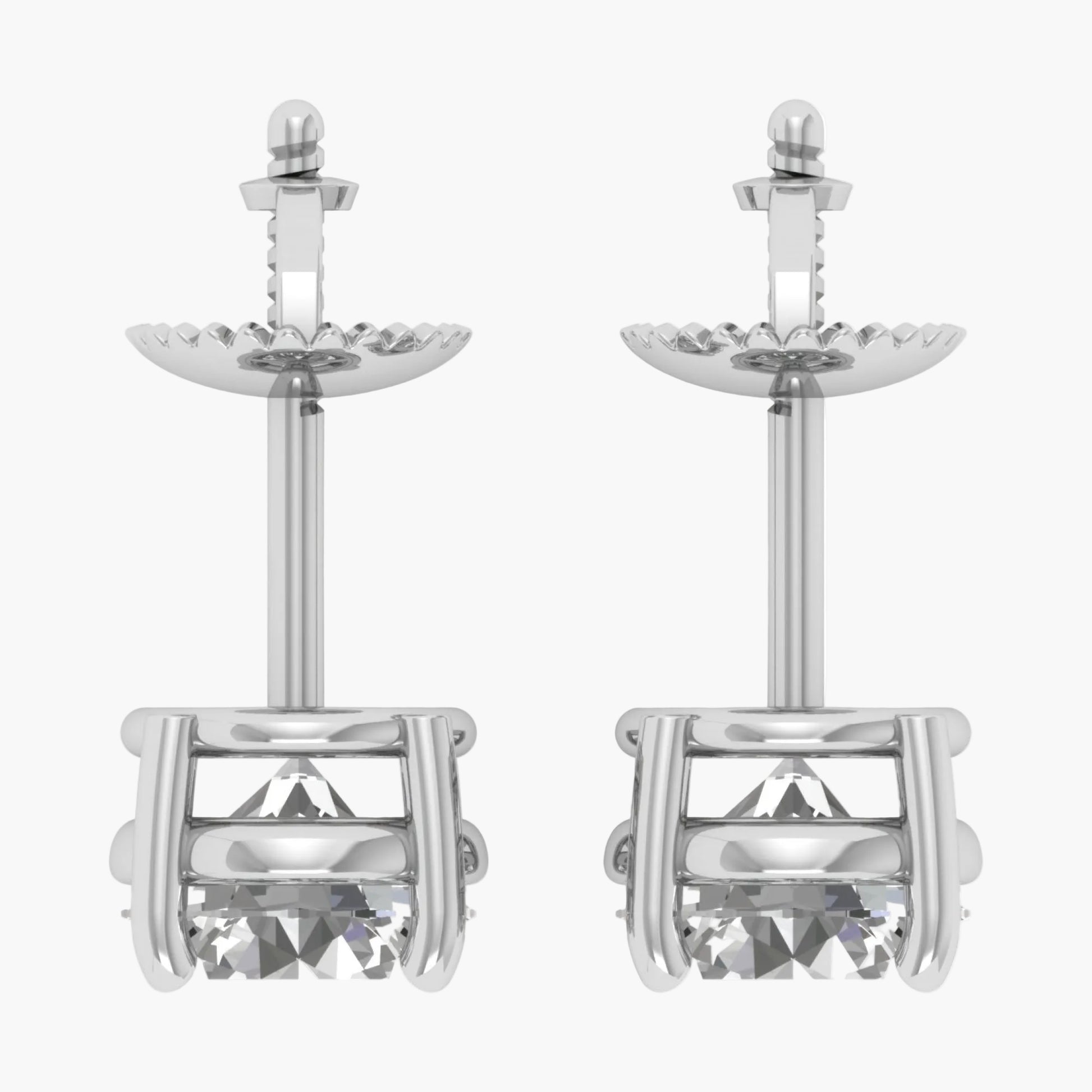Pair of silver earrings with clear gemstones on a white background