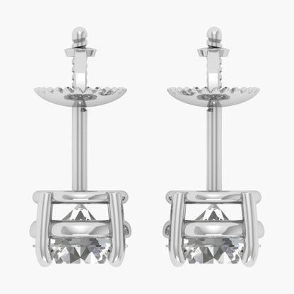 Pair of silver earrings with clear gemstones on a white background