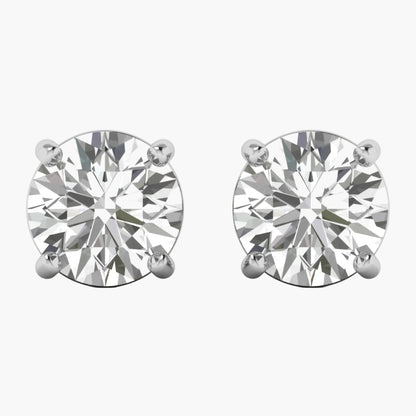 Pair of diamond stud earrings on a white background