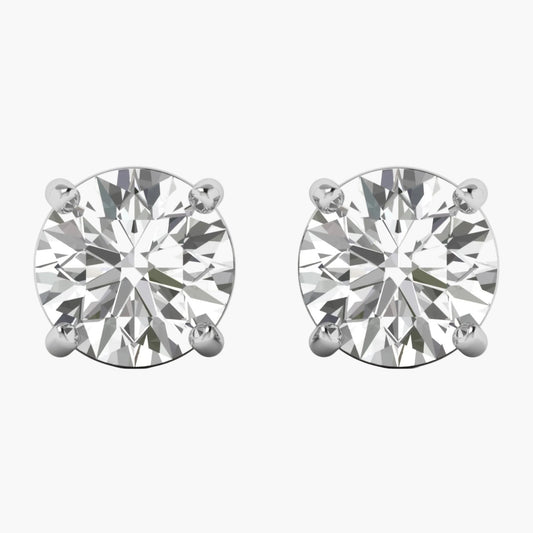 Pair of diamond stud earrings on a white background
