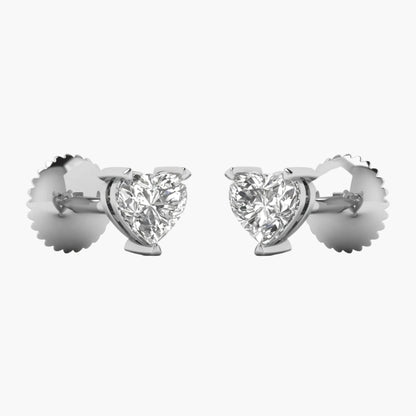 Heart-shaped diamond earrings on a white background