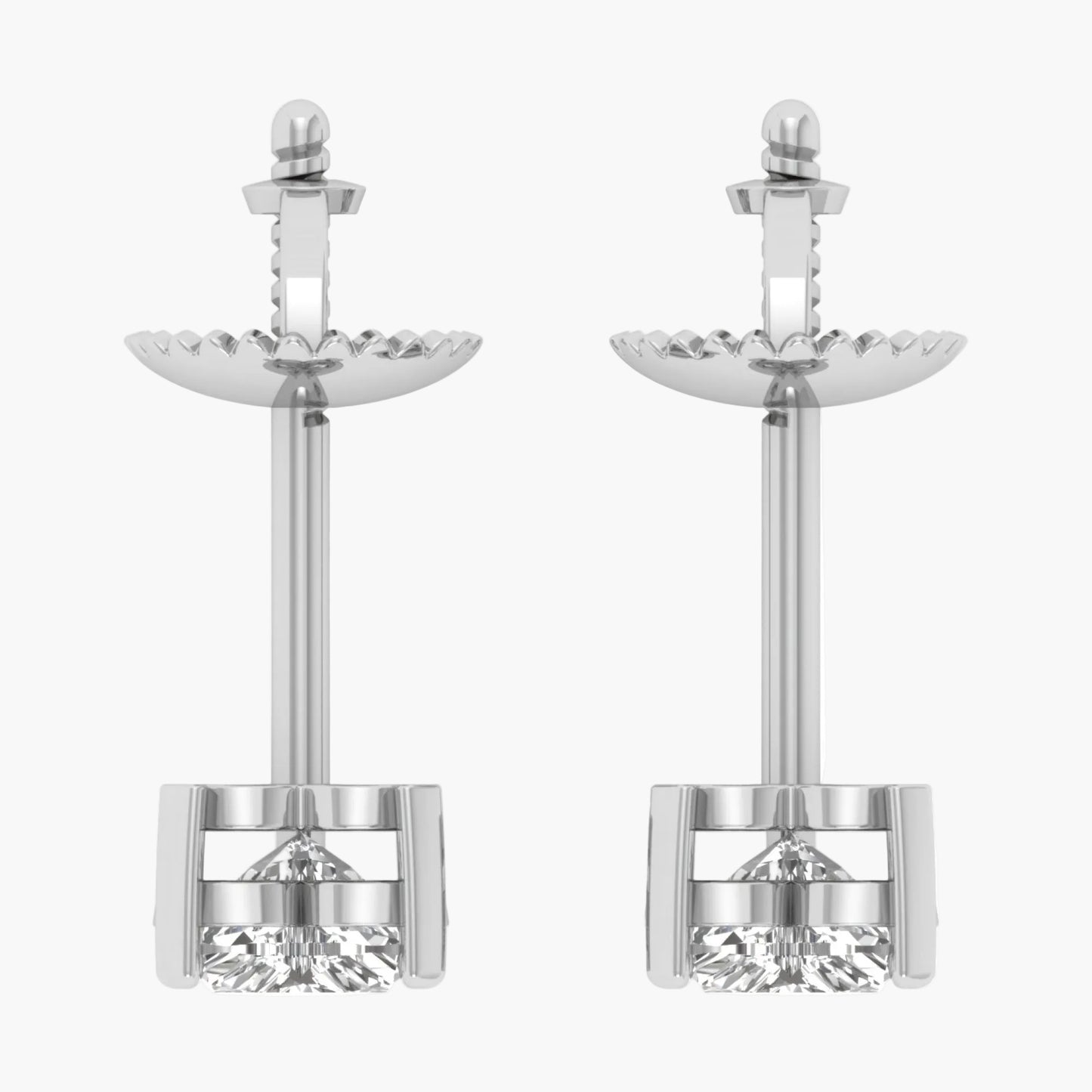 Pair of silver earrings with clear gemstones on a white background