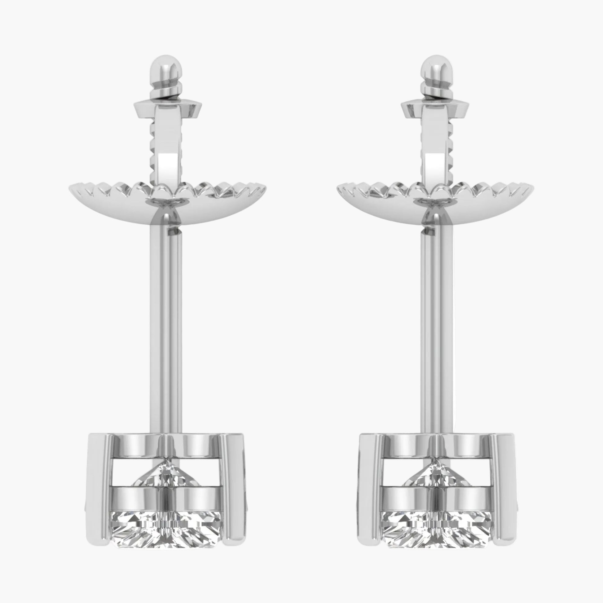 Pair of silver earrings with clear gemstones on a white background