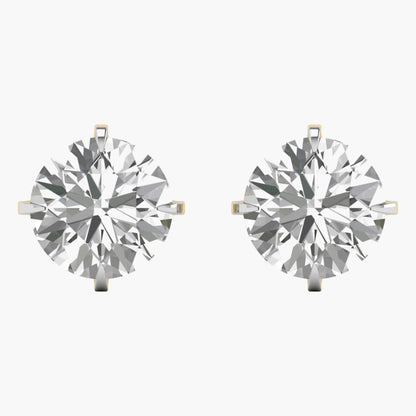 Pair of diamond earrings on a white background