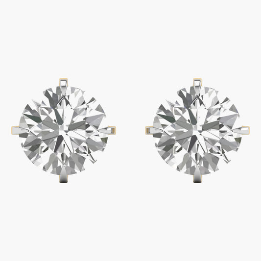 Pair of diamond earrings on a white background