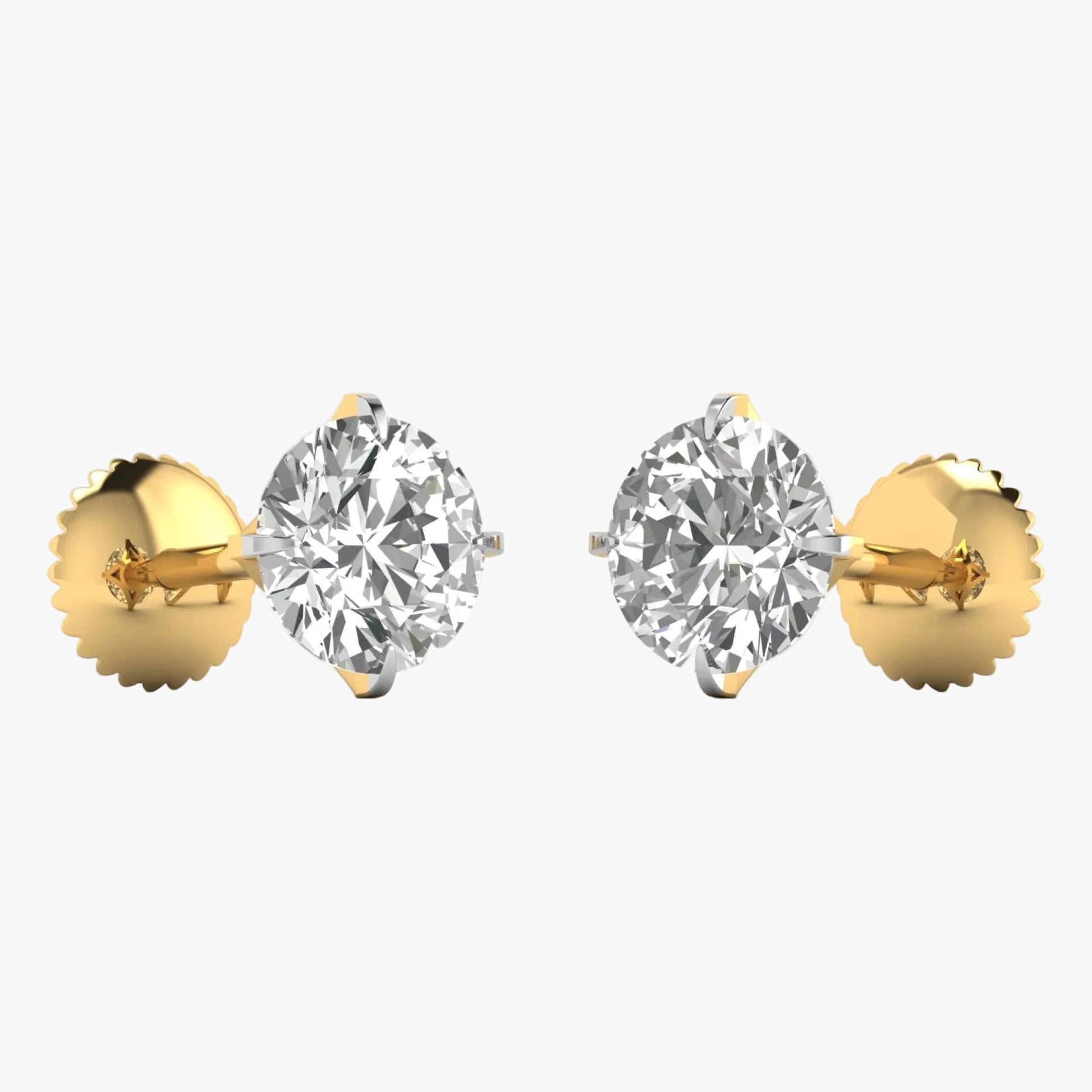 Pair of gold earrings with clear gemstones on a white background