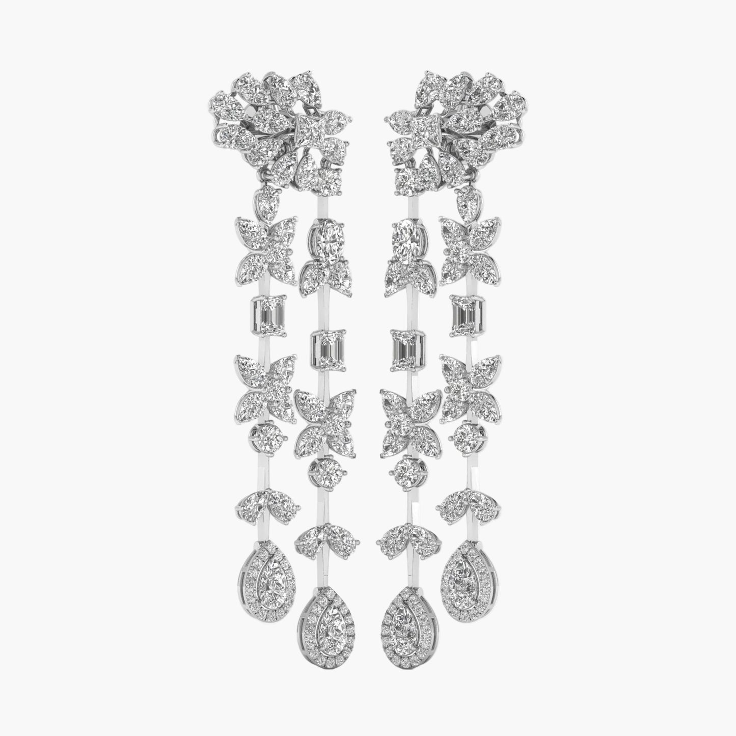 Elegant silver earrings with floral and butterfly designs on a white background