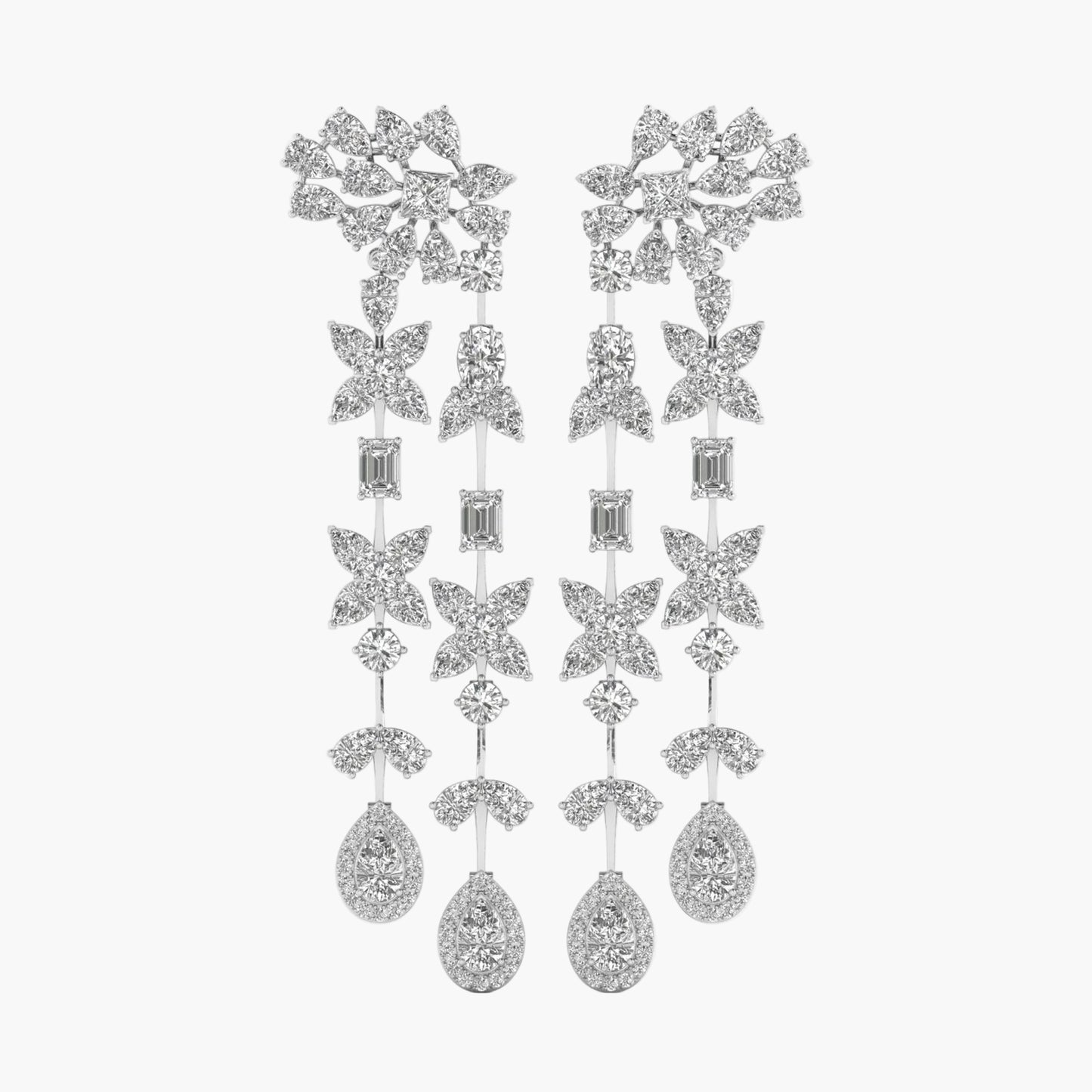 Pair of silver earrings with star-shaped designs on a white background