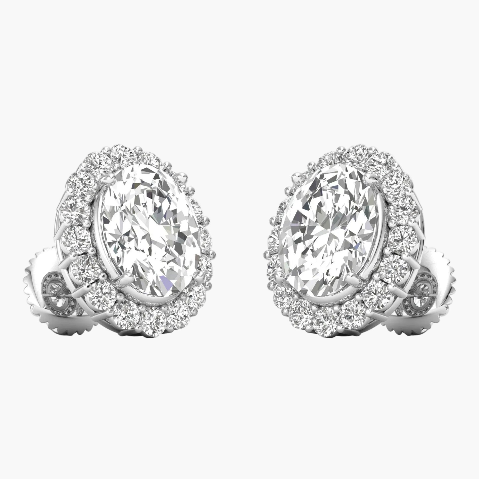 Pair of diamond earrings on a white background