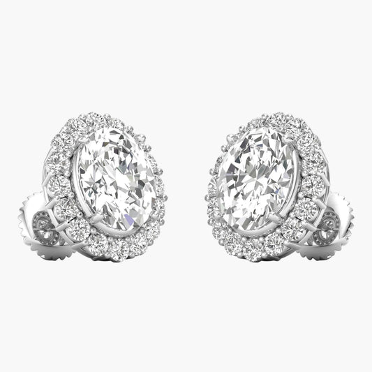 Pair of diamond earrings on a white background